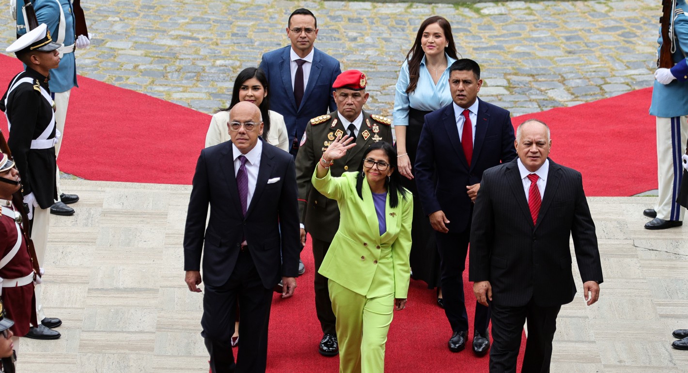 Group of people walking and waving