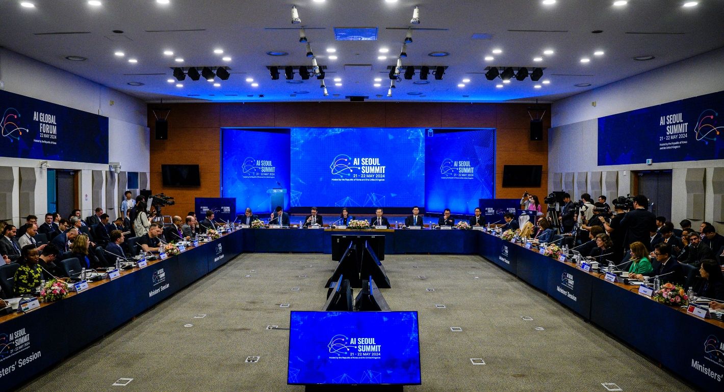 The AI Governance Arms Race: From Summit Pageantry to Progress?