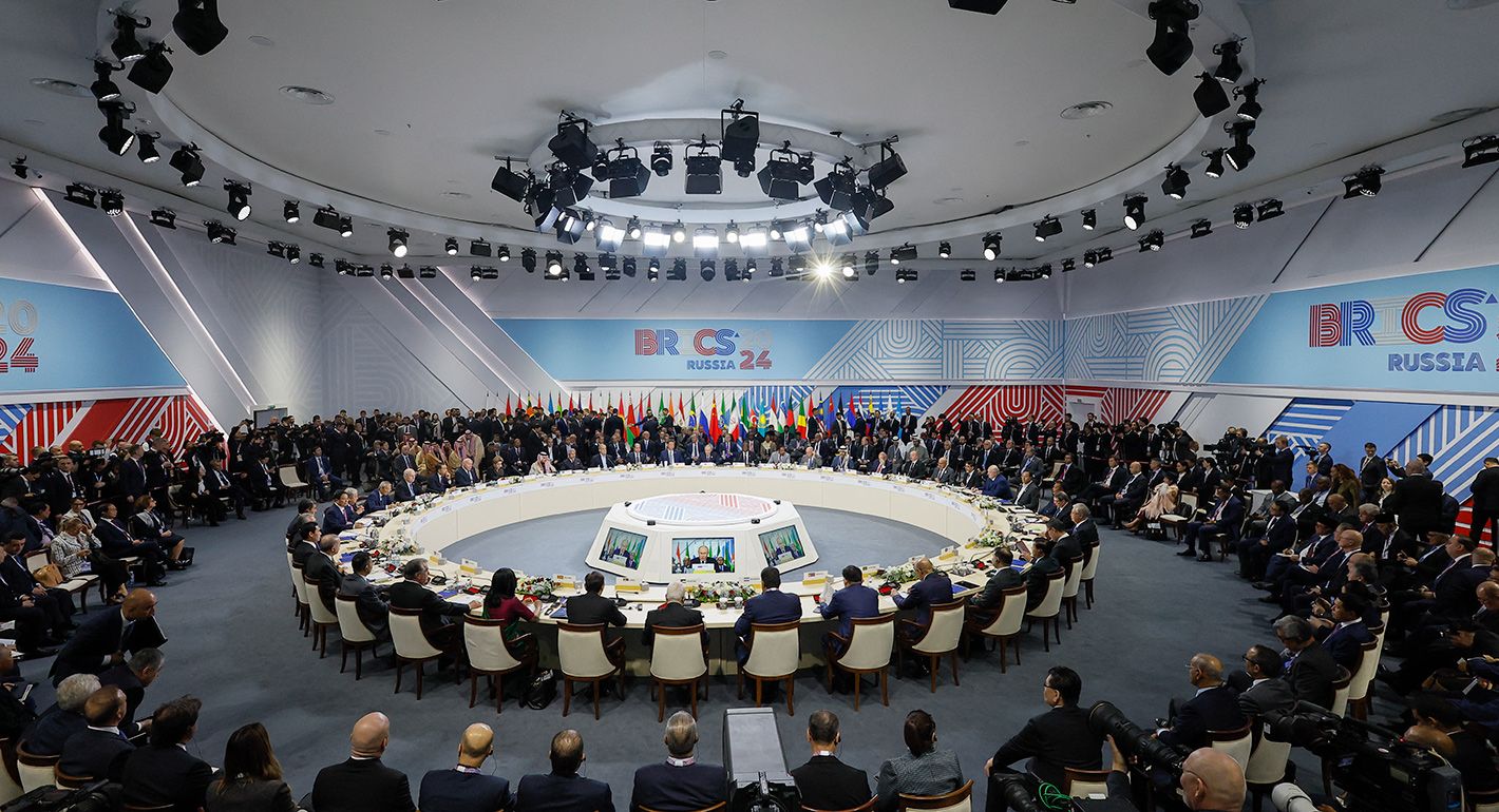 Officials attend a plenary session in the outreach/BRICS Plus format at the BRICS summit in Kazan on October 24, 2024