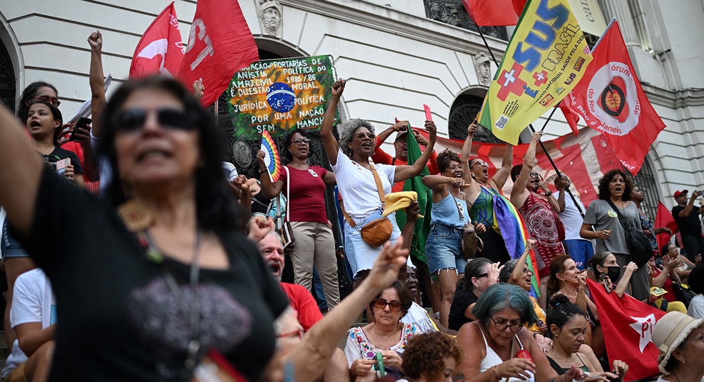 People attend a demonstration to mark the consolidation of democracy in Brazil, on the first anniversary of the far-right riots that rocked the Brazilian capital, at the Cinelandia square in Rio de Janeiro, Brazil, on January 08, 2024. 