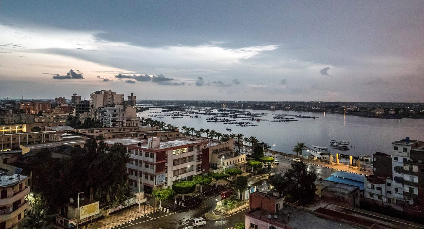 his picture taken on October 24, 2019 shows a view of a floating fish farm by the city of Rosetta on the Rosetta branch of the Nile river delta in Egypt's northern Beheira Governorate, some 55 kilometres northeast of Alexandria