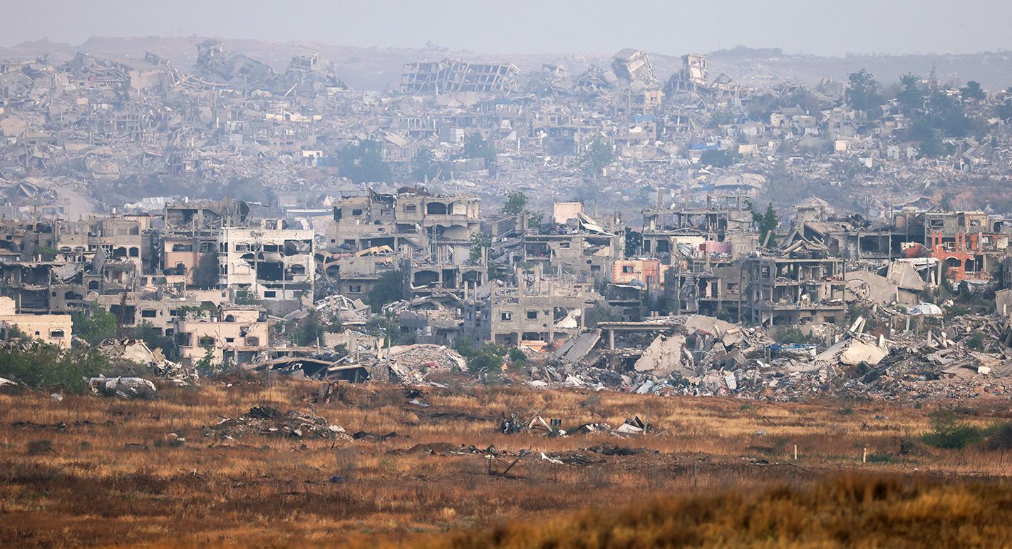 A picture taken from a position at the Israeli border with the Gaza Strip shows the destruction due to Israeli bombardment in the besieged Palestinian territory on May 18, 2025