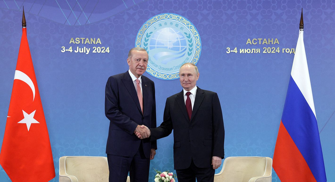 Russia's President Vladimir Putin meets with Turkey's President Recep Tayyip Erdogan on the sidelines of the Shanghai Cooperation Organisation (SCO) member states leaders' summit in Astana on July 3, 2024.